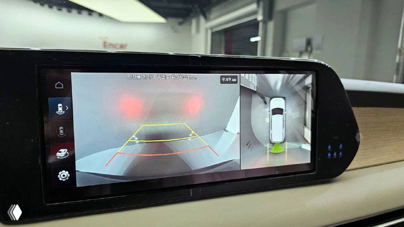 Камера заднего вида и экран парковочной подсистемы Hyundai Palisade на дисплее — демонстрация систем помощи при маневрировании и обзорности в салоне.