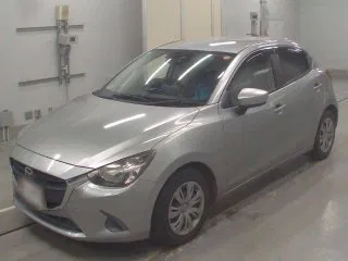 Mazda Demio 2016 — выиграна на японском аукционе