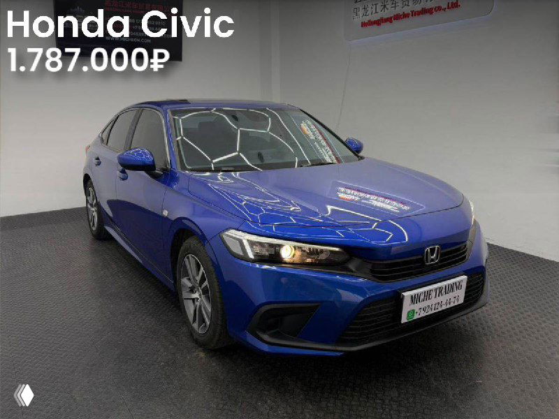 Синий Honda Civic 2021 года, вид спереди в шоуруме; на изображении видны детали передней части и цена в верхнем левом углу.