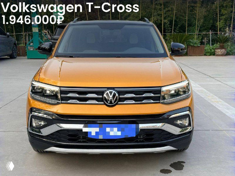 Оранжевый Volkswagen T‑Cross спереди на открытой площадке: цена 1.946.000₽, 2022 г., 1.4 л, 2WD, пробег 10 000 км, вид лота.