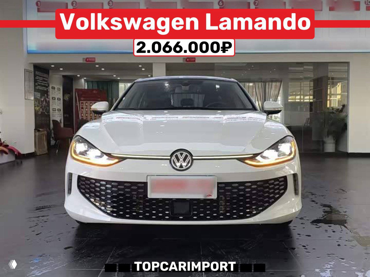 Фронтальный вид белого Volkswagen Lamando в салоне с ценой 2.066.000₽, крупный план передней части и фары, подпись TOPCARIMPORT