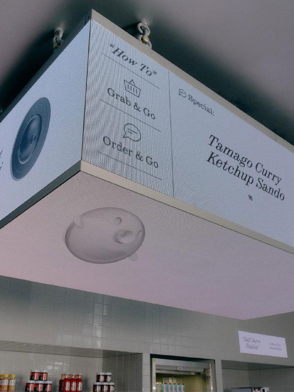 Подвесная панель с меню Suupaa: светлая прямоугольная вывеска на потолке, крупный шрифт, пиктограммы и минималистичные секции меню в дизайне.