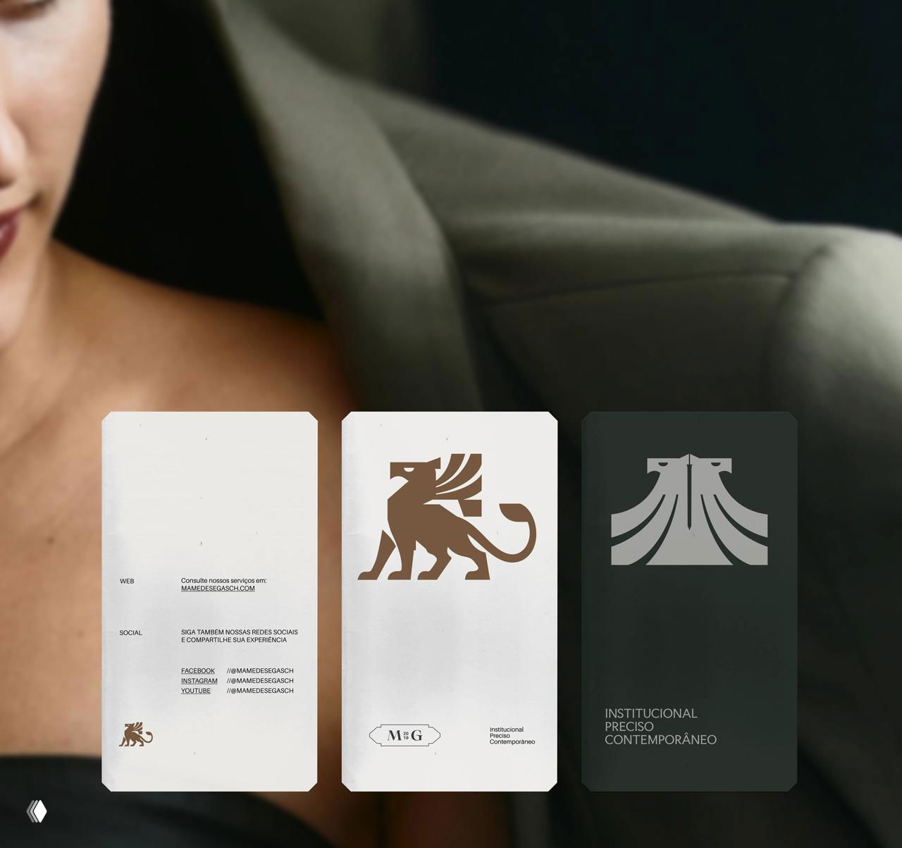 Три визитки на фоне ткани и одежды — варианты оформления, где логотип‑грифон и секции информации выдержаны в сдержанной палитре и типографике.