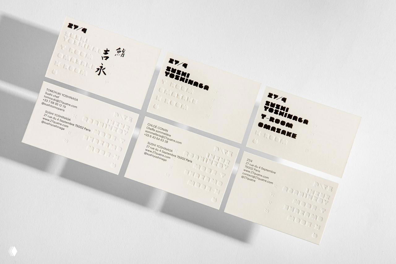 Набор визитных карточек с тиснением, минимальной типографикой и чистой композицией; демонстрация тактильного подхода к фирменным носителям ресторана 27/4