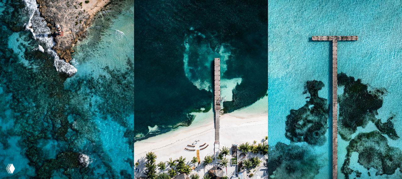 Триптих аэрофотоснимков: пирс, берег и крупные фрагменты рифа в декоративной композиции, подчёркнутой с воздуха.
