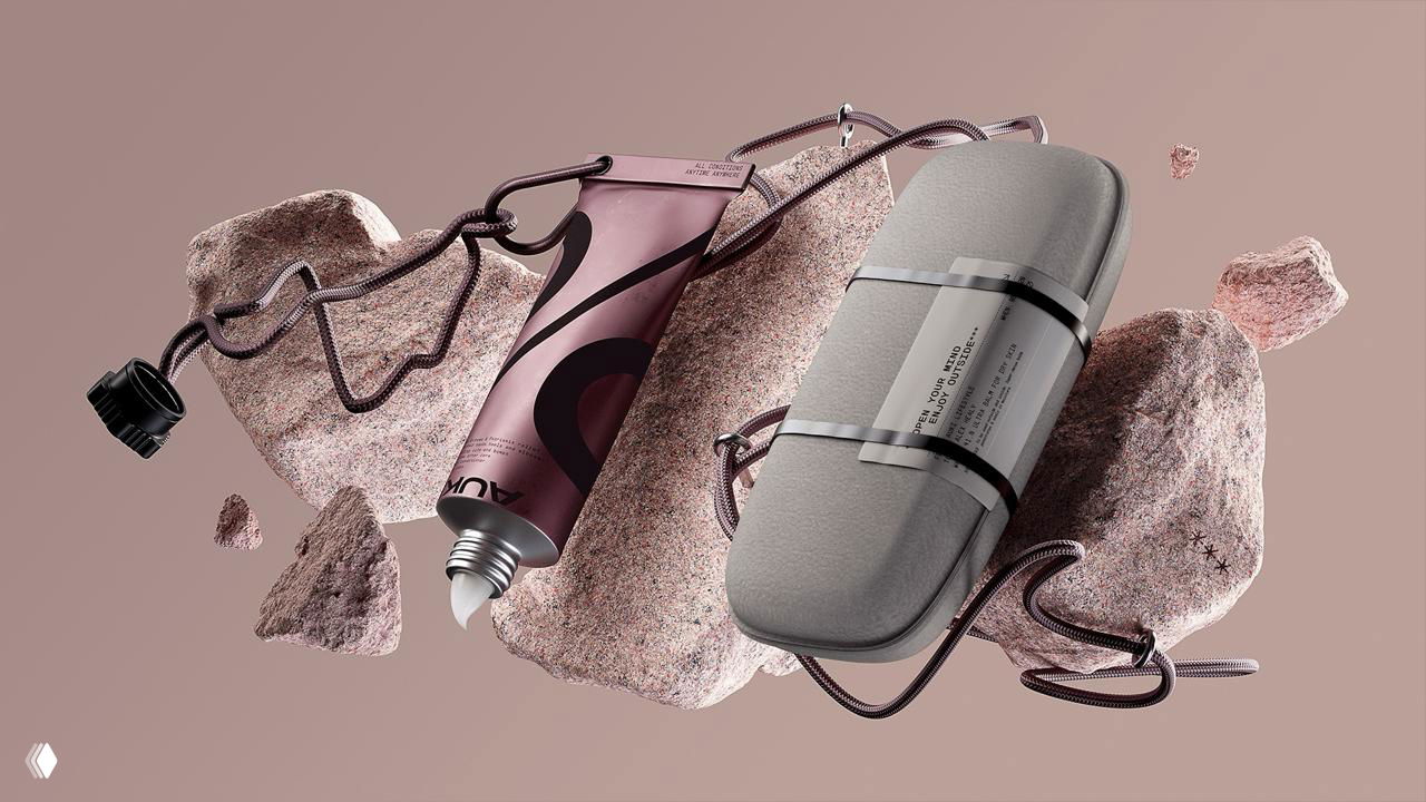 Коллаж с тюбиком AUKI и войлочной упаковкой на фоне летающих камней и декоративных шнуров, подчёркивающий outdoor-концепт и утилитарную эстетику бренда.