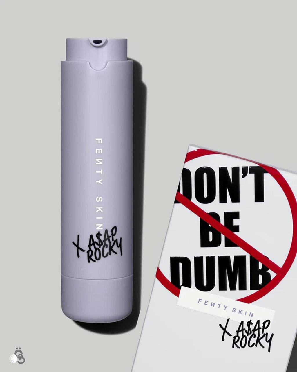 Лиловый флакон с надписью Fenty Skin рядом с упаковкой с надписью "DON'T BE DUMB" — фото лимитированной линейки A$AP Rocky x Fenty Skin.