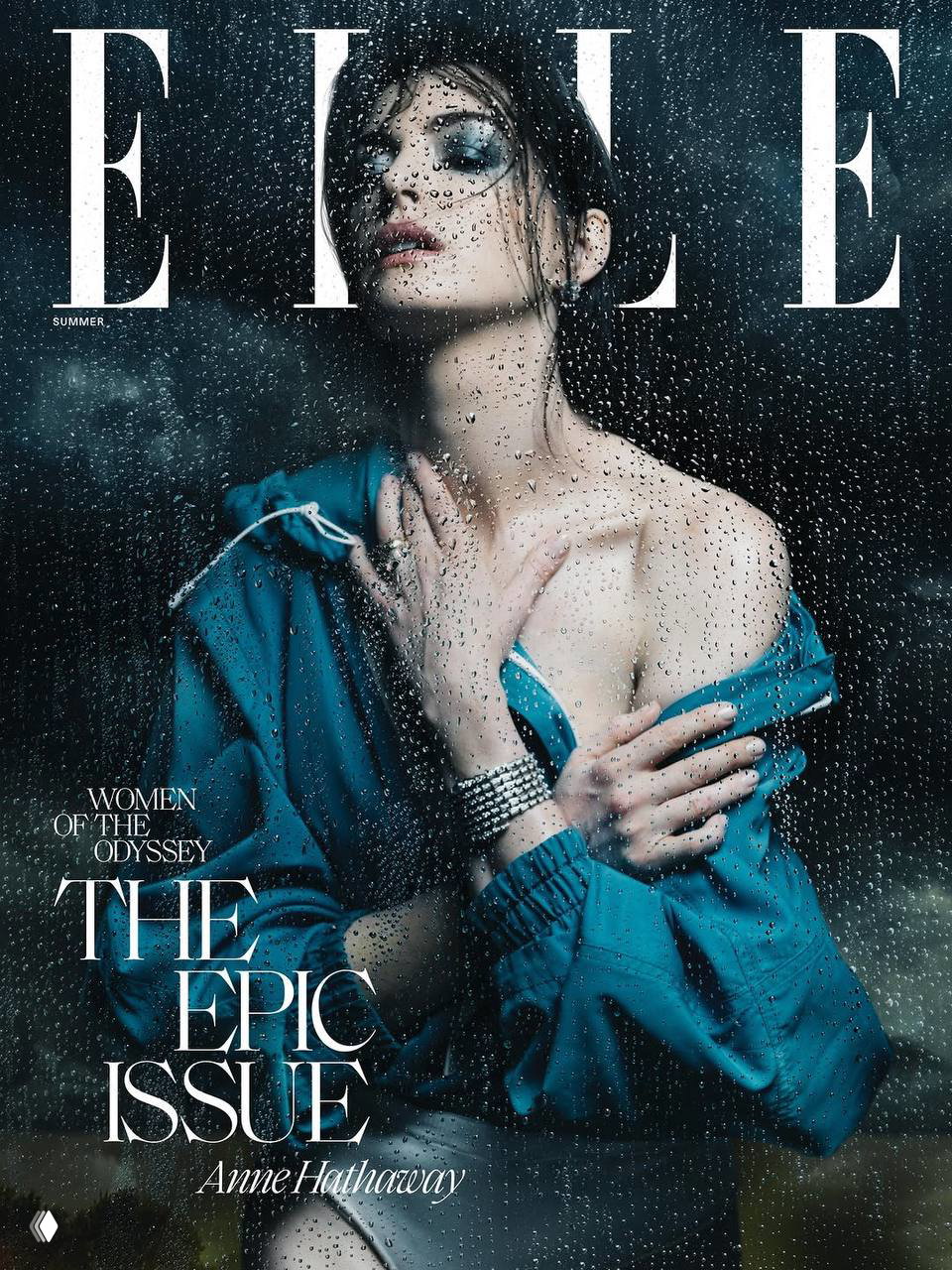 Энн Хэтэуэй на обложке ELLE сквозь капли воды: задумчивый портрет в дождевом мотиве, акцент на драматичность и моду.