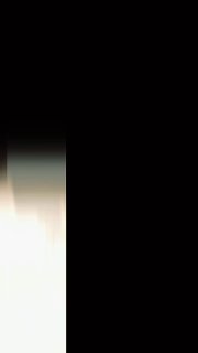 Вертикальное превью видео из поездки: тёмный размытый фон, верхняя часть почти чёрная, внизу светлая нечеткая полоса.
