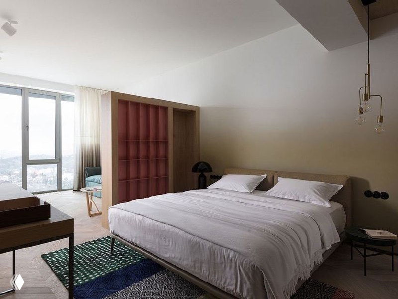 Интерьер мансардной спальни с наклонным панорамным окном, двумя кроватями и абстрактным цифровым искажением на превью изображении