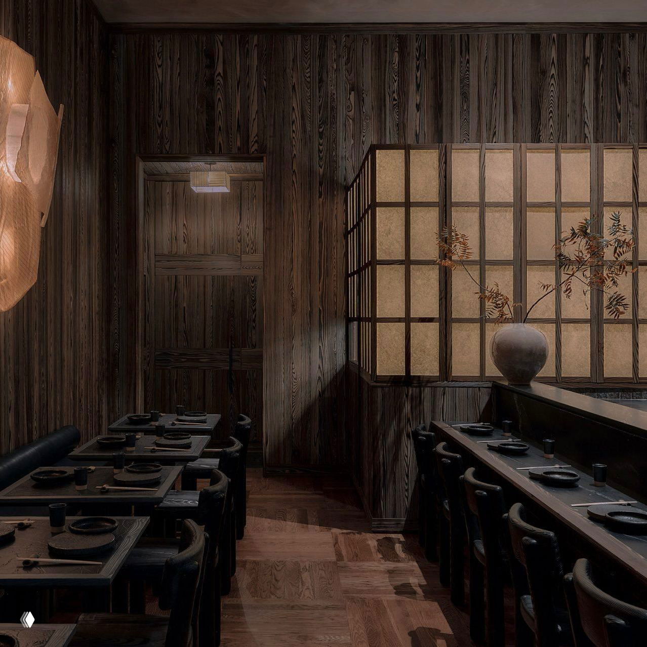 Общий вид зала с панелями обугленного кипариса, бумажными перегородками в японском стиле и аккуратно расставленной посудой на столах.