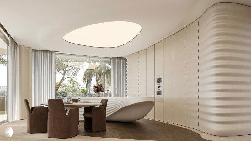 Детальный вид внутренней волнообразной перегородки: текстура фибробетона, встроенные ниши и скрытое освещение, формирующие плавный поток пространства.