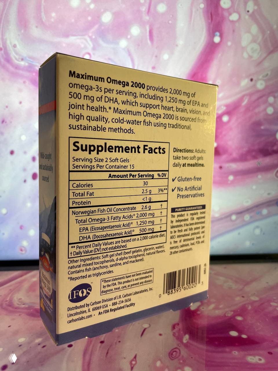 Обратная сторона упаковки Carlson с таблицей Supplement Facts: указаны EPA 1,250 mg и DHA 500 mg, информация о содержимом и пищевой ценности.