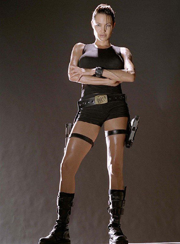 Искажённое или повреждённое превью с образом Лары Крофт: видны артефакты, полосы и фрагменты фигуры, файл изображения частично коррумпирован.