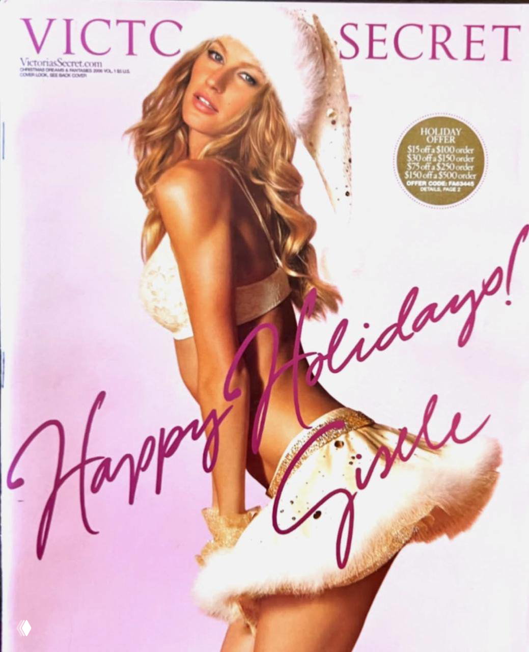 Обложка Victoria’s Secret: блондинка в белой меховой шапке и праздничном комплекте, поза в профиль на светлом фоне с логотипом.