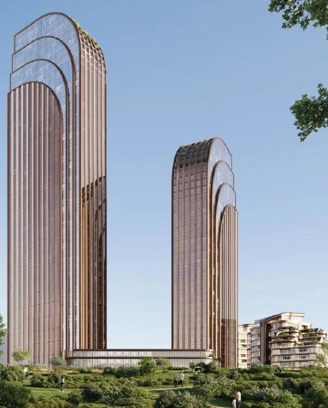 Дневной ракурс рендера: два вытянутых корпуса с арочными торцами и полностью стеклянным фасадом на светлом небе