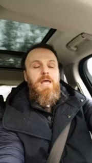 Сергей Макаров в машине объясняет кейс по кладовым в коротком видео; видно верх салона, ремень безопасности и лицо автора при записи.