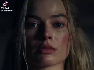 Крупный план лица в драматичном освещении — стоп-кадр из видеоролика или тизера, подчёркивающий эмоции и напряжение кадра.