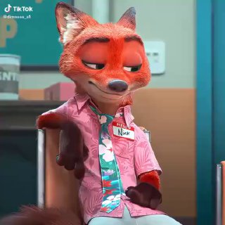 Кадр клипа: Ник Уайлд в розовой рубашке и бейдже с именем, задумчивое выражение лица, сцена из мультфильма.