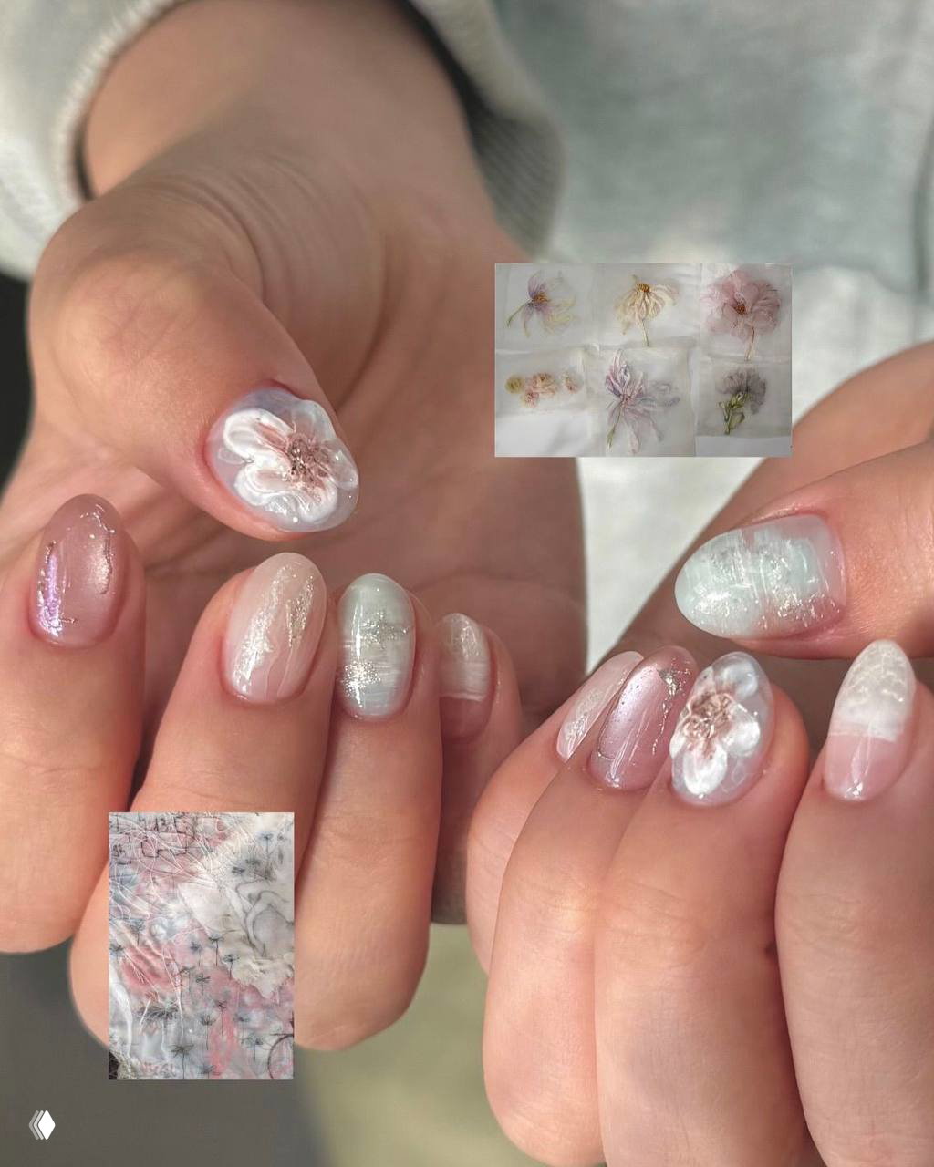 Две руки с короткими ногтями, украшенные объёмными цветами и нежными перламутровыми вкраплениями; близкий план салонного маникюра.