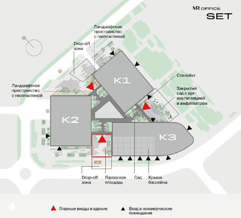 Крупный план стеклянного перехода и витрин коммерческих помещений в нижней части проекта SET, видны люди внутри и ландшафтные элементы.