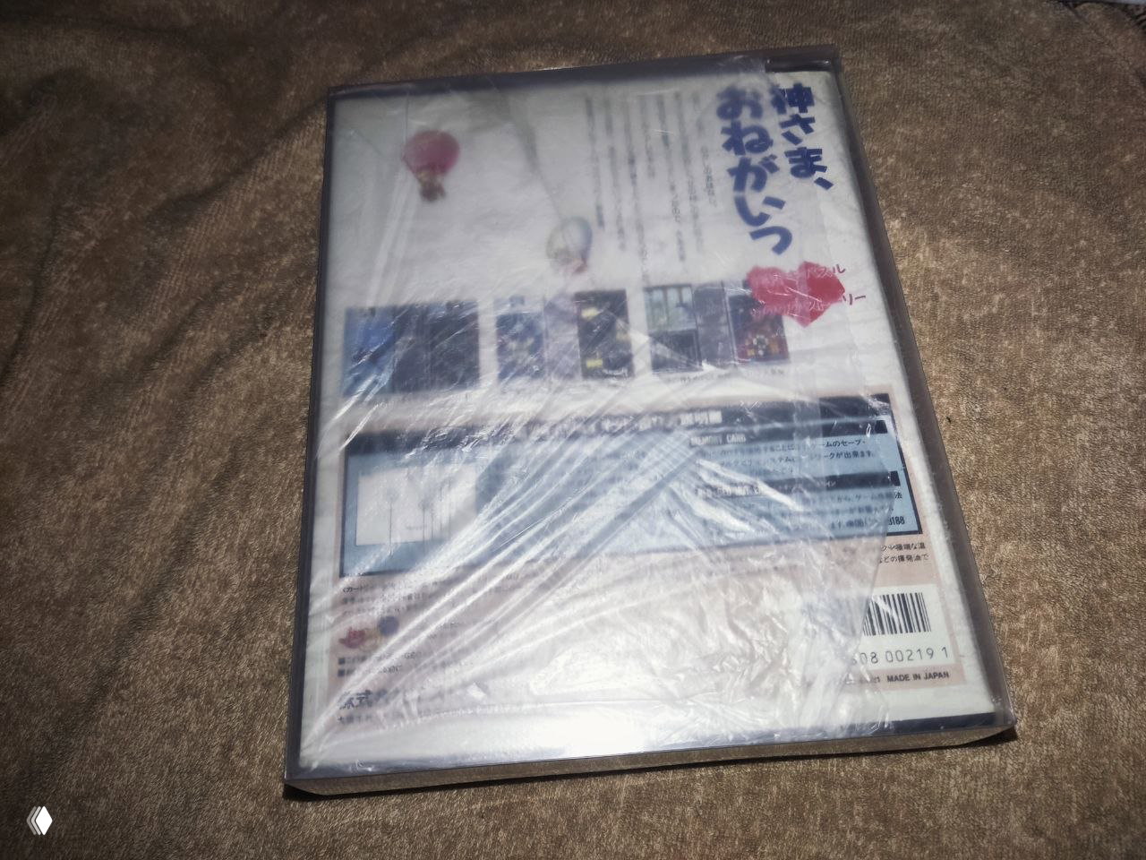 Задняя сторона коробки Joy Joy Kid для Neo Geo AES, видно покрытие пленкой, штрих-код и превью скриншотов на обороте.