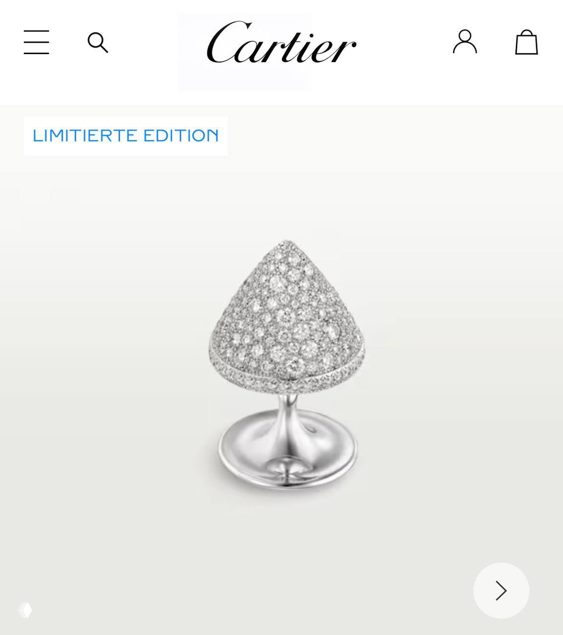 Фотография ювелирного изделия Cartier: конусообразное кольцо с паве из бриллиантов на белом фоне, напоминающее форму анальной затычки.