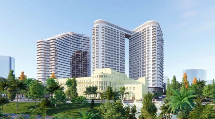 Высокие многоэтажные корпуса гостиничного комплекса на зелёном фоне — архитектурная визуализация крупного отельного проекта