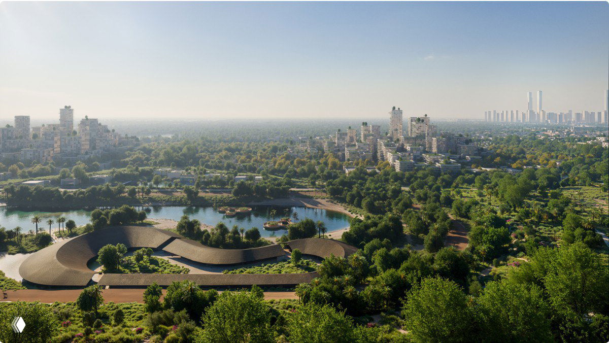 Дневной рендер концепции: парк с водными элементами и низкоэтажной зелёной застройкой, подчёркивающей общественные пространства